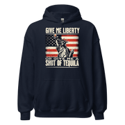 Hoodie with Give Me Liberty or Give Me a Shot of Tequila text, Statue of Liberty holding a shot glass, and distressed American flag background. Perfect for 4th of July.