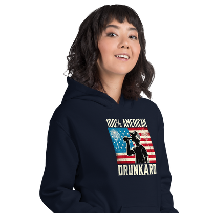 4th of July Hoodie with '100% American Drunkard' text, man drinking a bottle of beer wearing a trucker hat, and distressed American flag background