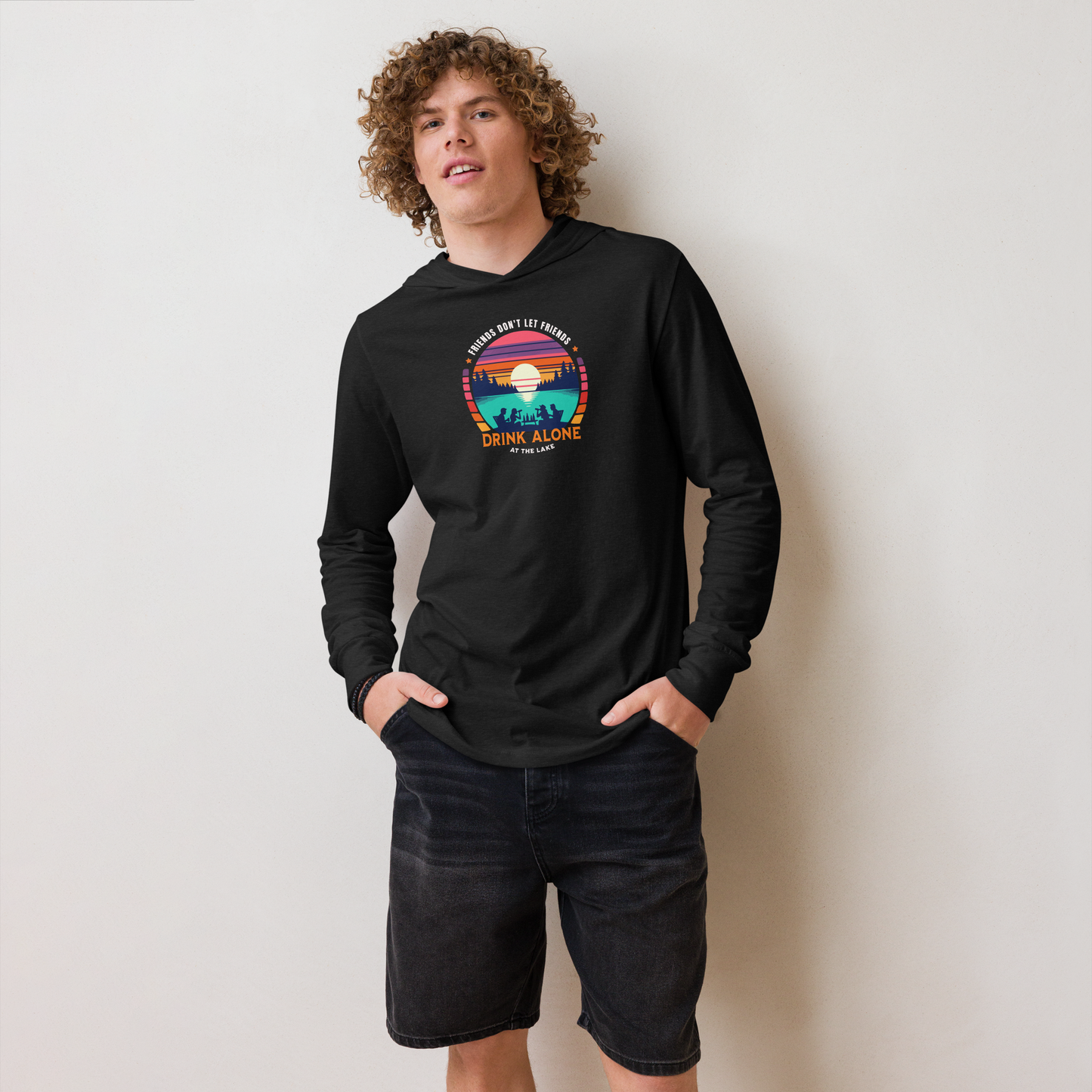 Lightweight hoodie depicting friends drinking by the lake under a retro sunset, perfect for cooler evenings.