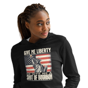 Lightweight hoodie with Give Me Liberty or Give Me a Shot of Bourbon text, Statue of Liberty holding a shot glass, and distressed American flag background. Perfect for 4th of July.