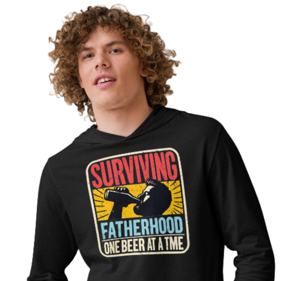 Celebrate fatherhood with our "Surviving Fatherhood One Beer at a Time" lightweight hoodie. Perfect gift for dads on Father's Day or any occasion.