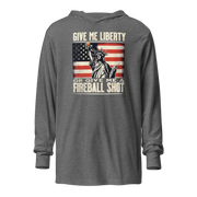 Lightweight hoodie with 'Give Me Liberty or Give Me a Fireball Shot' text, Statue of Liberty holding a shot glass, and distressed American flag background. Perfect for 4th of July."