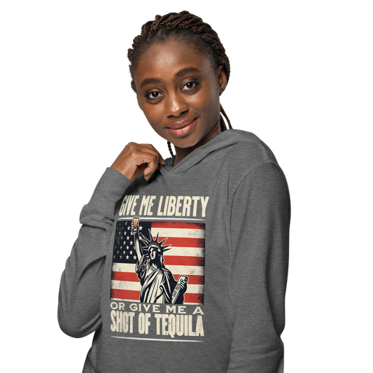 Lightweight hoodie with Give Me Liberty or Give Me a Shot of Tequila text, Statue of Liberty holding a shot glass, and distressed American flag background. Perfect for 4th of July.
