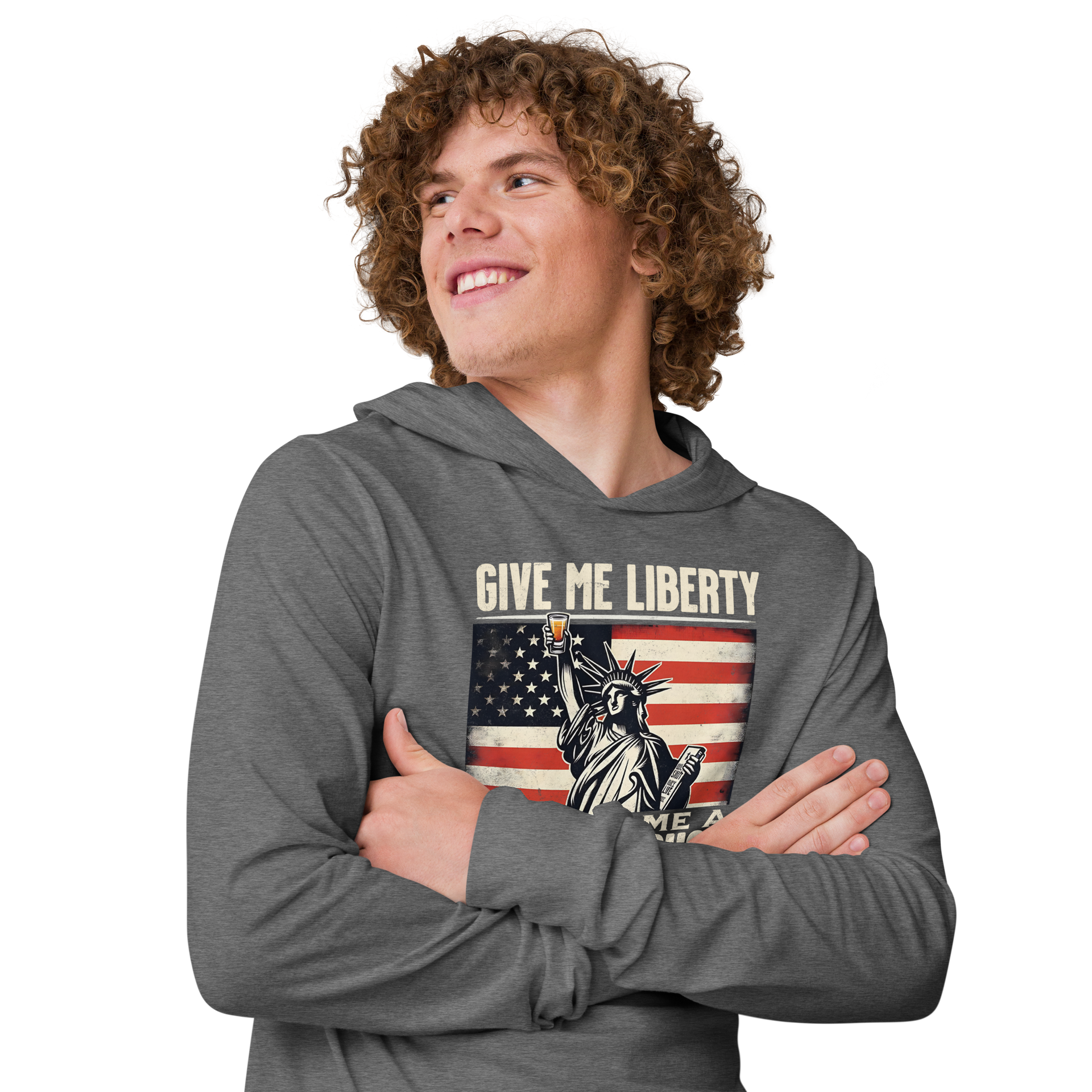 Lightweight hoodie with 'Give Me Liberty or Give Me a Fireball Shot' text, Statue of Liberty holding a shot glass, and distressed American flag background. Perfect for 4th of July."