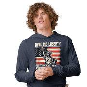 Lightweight hoodie with Give Me Liberty or Give Me a Shot of Tequila text, Statue of Liberty holding a shot glass, and distressed American flag background. Perfect for 4th of July.