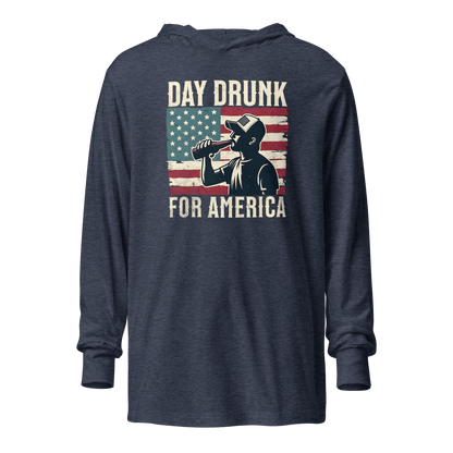 Lightweight hoodie with Day Drunk for America text, silhouette of a man drinking a bottle of beer, and distressed American flag background. Perfect for 4th of July.