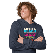 Lightweight hoodie with the phrase "Life's a Beach but I Prefer It with a Lakeside View and a Cocktail" in vibrant colors.