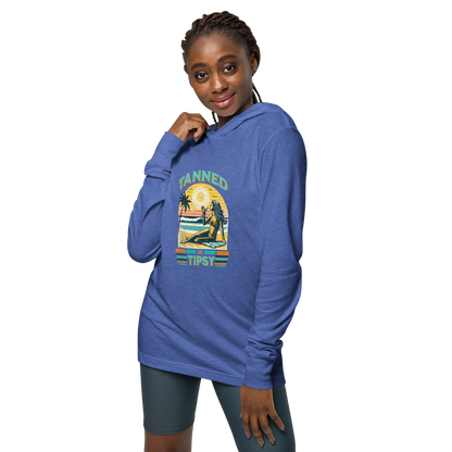 Lightweight 'Tanned and Tipsy' hoodie featuring a retro beach cocktail design, perfect for cooler summer evenings and stylish beach parties.