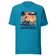 Man lounging in a beach chair with a cocktail, wearing our 'Sorry, Out of Office' vintage tee against a retro sunset backdrop.