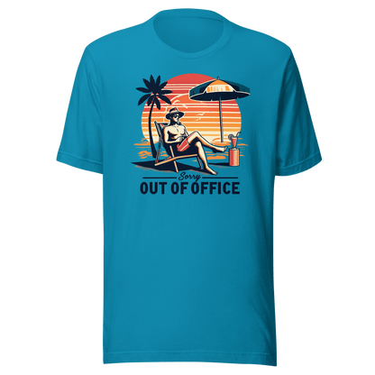 Man lounging in a beach chair with a cocktail, wearing our 'Sorry, Out of Office' vintage tee against a retro sunset backdrop.