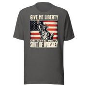 'Give Me Liberty or Give Me Whiskey' text, Statue of Liberty holding a shot glass, and distressed American flag background