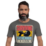 Celebrate fatherhood with our "Surviving Fatherhood One Beer at a Time" t-shirt. Perfect gift for dads who love a cold one. Ideal for Father's Day or birthdays.