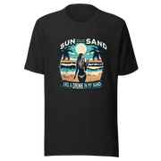 Woman with cocktail on beach on 'Sun, Sand, and a Drink in My Hand' tee, showcasing ocean and sun background