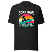 Tee with "Boar Hair Don't Care, But Where's My Drink?" and a woman on a jet ski against a retro sunset backdrop.