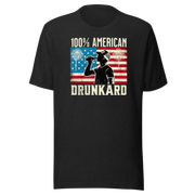 4th of July T-shirt with '100% American Drunkard' text, man drinking a bottle of beer wearing a trucker hat, and distressed American flag background