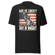 'Give Me Liberty or Give Me Whiskey' text, Statue of Liberty holding a shot glass, and distressed American flag background