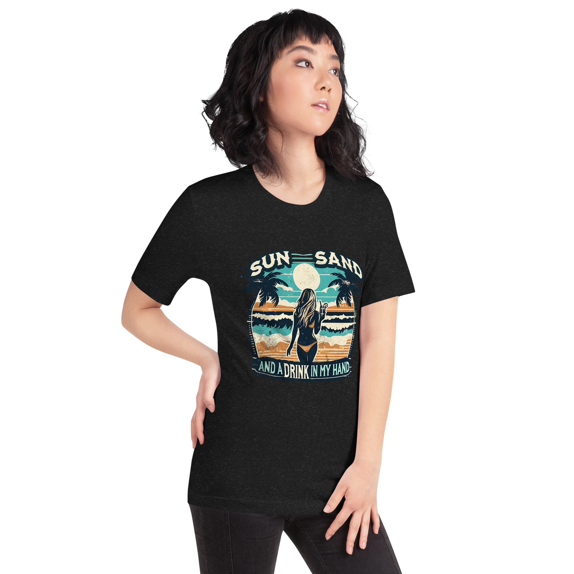 Woman with cocktail on beach on 'Sun, Sand, and a Drink in My Hand' tee, showcasing ocean and sun background