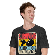 Celebrate fatherhood with our "Surviving Fatherhood One Beer at a Time" t-shirt. Perfect gift for dads who love a cold one. Ideal for Father's Day or birthdays.