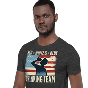 T-shirt with Red White and Blue Drinking Team text, man drinking beer, and distressed American flag background. Perfect for 4th of July.