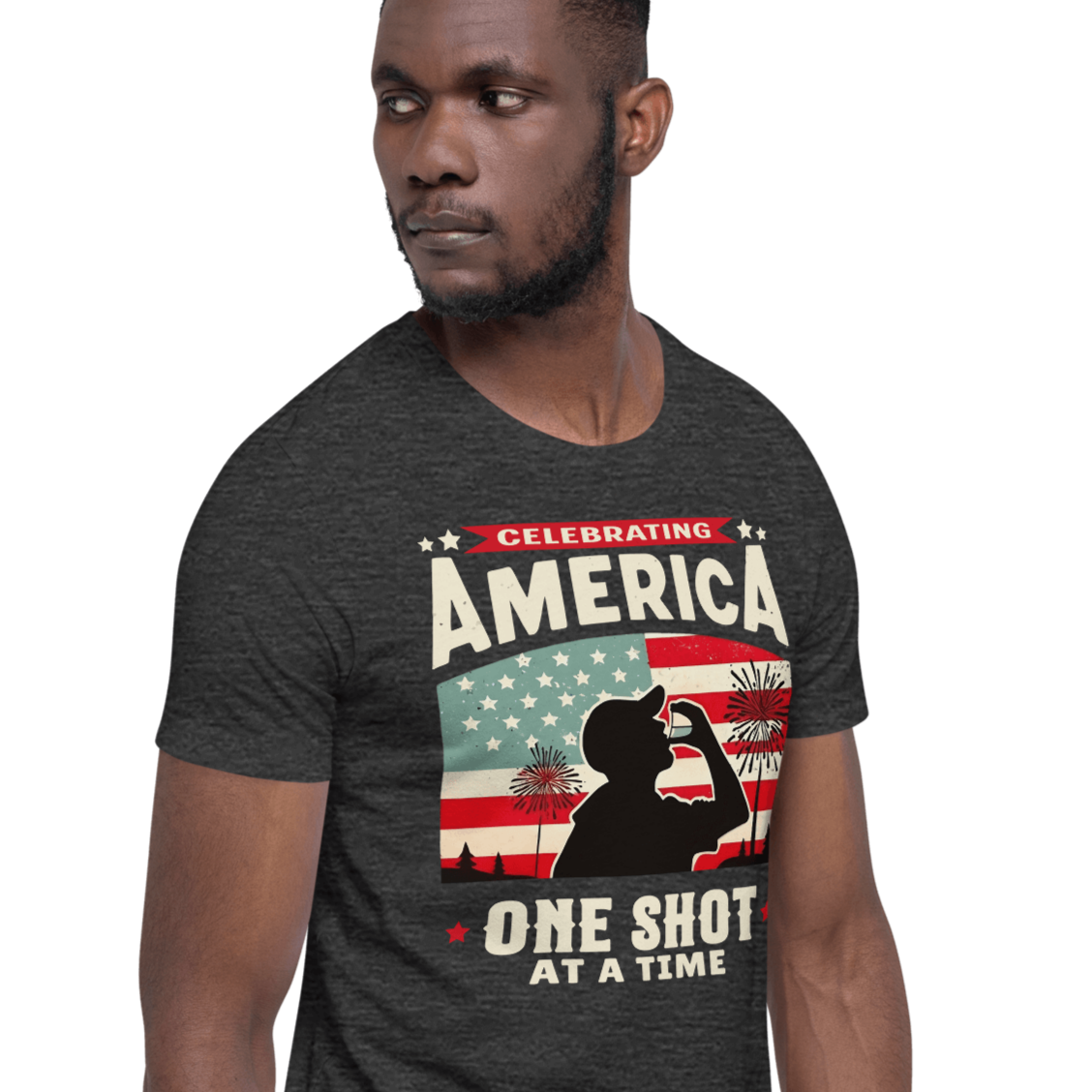 T-shirt with Celebrating America One Shot at a Time text, silhouette of a man drinking a shot, and distressed American flag background. Perfect for 4th of July.