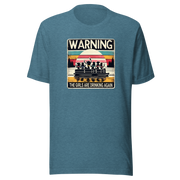 Tee showing "Warning: The Girls Are Drinking Again" with an image of girls on a pontoon boat enjoying drinks at sunset.