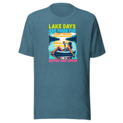 Tee with "Lake Days Are Made for Sipping and Dipping," featuring a woman on a tube float with a cocktail, lake and sunset backdrop.