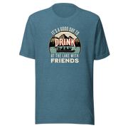 Tee with "It's a Good Day to Drink at the Lake with Friends," showing people drinking on a boat, with lake and mountain views.