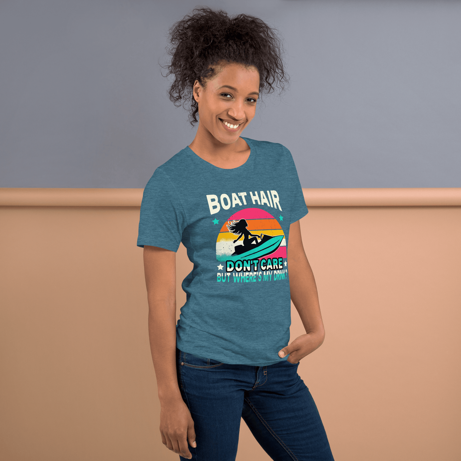 Tee with "Boar Hair Don't Care, But Where's My Drink?" and a woman on a jet ski against a retro sunset backdrop.