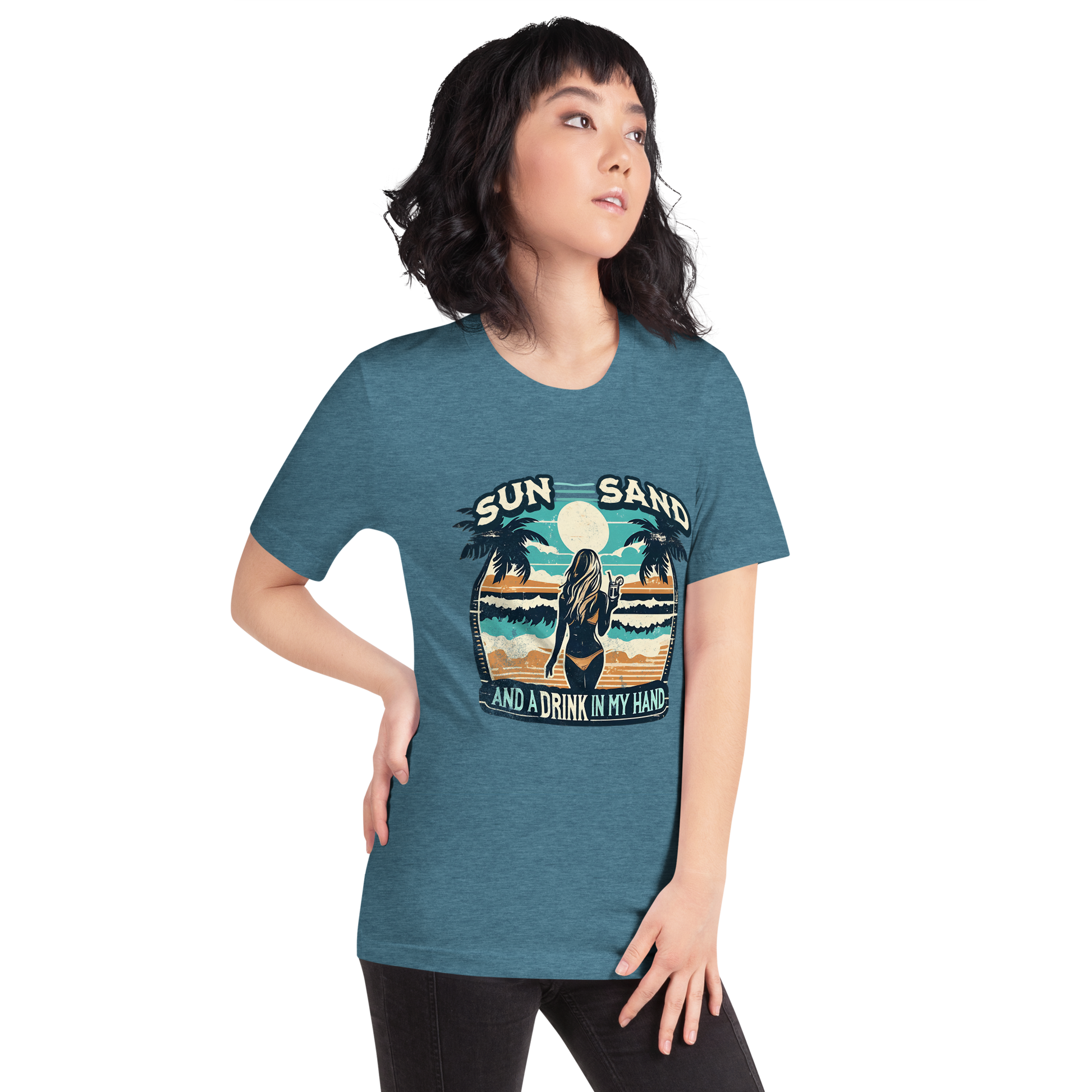 Woman with cocktail on beach on 'Sun, Sand, and a Drink in My Hand' tee, showcasing ocean and sun background