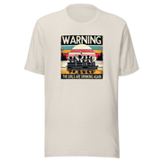 Tee showing "Warning: The Girls Are Drinking Again" with an image of girls on a pontoon boat enjoying drinks at sunset.