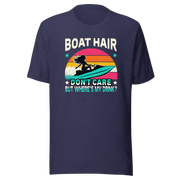 Tee with "Boar Hair Don't Care, But Where's My Drink?" and a woman on a jet ski against a retro sunset backdrop.