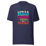 Tee displaying "Life's a Beach but I Prefer It with a Lakeside View and a Cocktail" in bright, eye-catching colors.