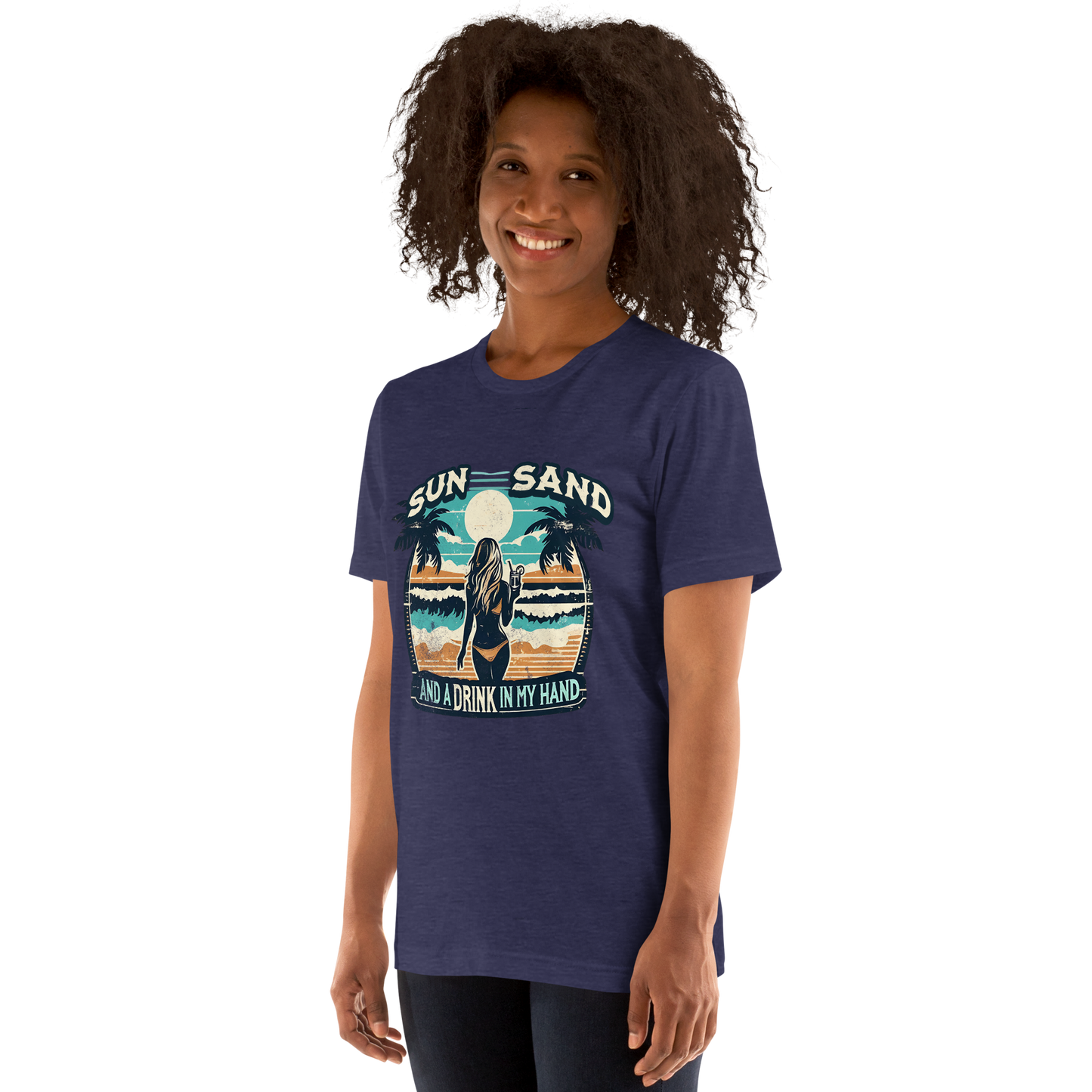 Woman with cocktail on beach on 'Sun, Sand, and a Drink in My Hand' tee, showcasing ocean and sun background