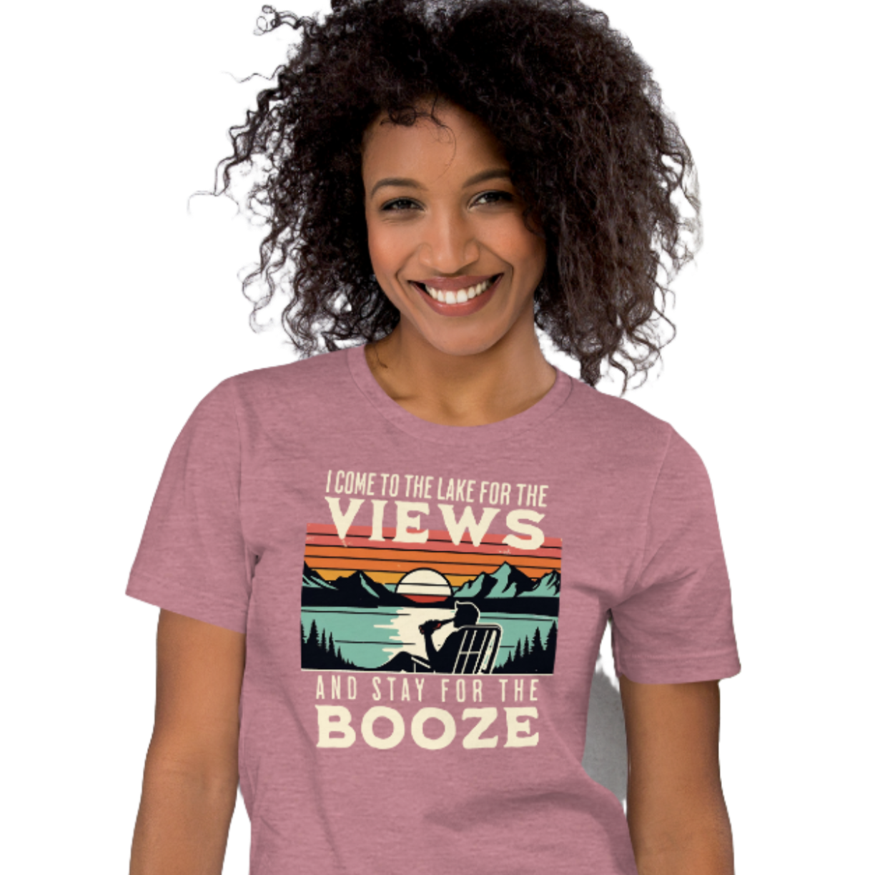 Tee showing "I Come to the Lake for the Views and Stay for the Booze," with a man in a beach chair, lake, and retro sunset.