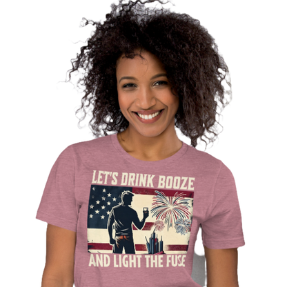 4th of July T-shirt with 'Let's Drink Booze and Light the Fuse' text, featuring a festive, patriotic theme