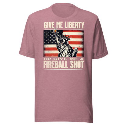 T-shirt with 'Give Me Liberty or Give Me a Fireball Shot' text, Statue of Liberty holding a shot glass, and distressed American flag background.