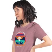 Tee showcasing "Friends Don't Let Friends Drink Alone at the Lake" with a retro sunset and lake scene.