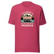 Tee with "It's a Good Day to Drink at the Lake with Friends," showing people drinking on a boat, with lake and mountain views.