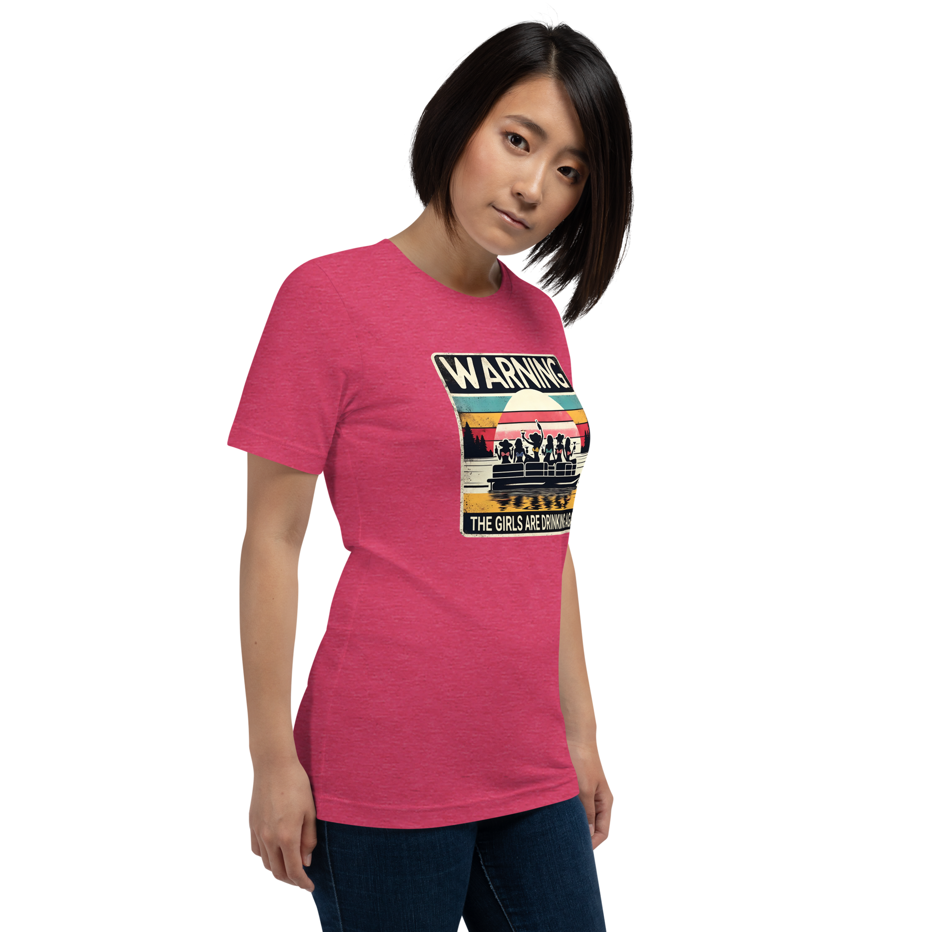 Tee showing "Warning: The Girls Are Drinking Again" with an image of girls on a pontoon boat enjoying drinks at sunset.