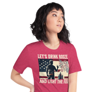 4th of July T-shirt with 'Let's Drink Booze and Light the Fuse' text, featuring a festive, patriotic theme