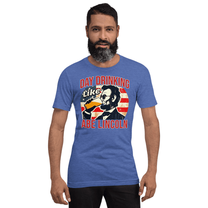 T-shirt with Day Drinking Like Abe Lincoln text, image of Abe Lincoln drinking a glass of beer, and distressed American flag background. Perfect for 4th of July.