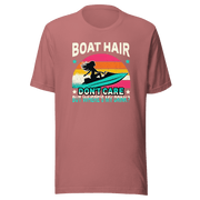 Tee with "Boar Hair Don't Care, But Where's My Drink?" and a woman on a jet ski against a retro sunset backdrop.