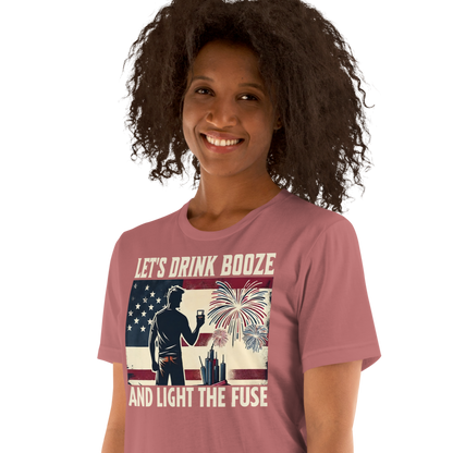 4th of July T-shirt with 'Let's Drink Booze and Light the Fuse' text, featuring a festive, patriotic theme