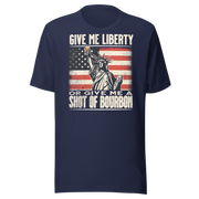 T-shirt with Give Me Liberty or Give Me a Shot of Bourbon text, Statue of Liberty holding a shot glass, and distressed American flag background. Perfect for 4th of July.