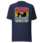 Celebrate fatherhood with our "Surviving Fatherhood One Beer at a Time" t-shirt. Perfect gift for dads who love a cold one. Ideal for Father's Day or birthdays.