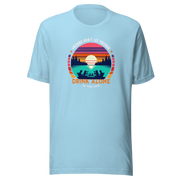 Tee showcasing "Friends Don't Let Friends Drink Alone at the Lake" with a retro sunset and lake scene.