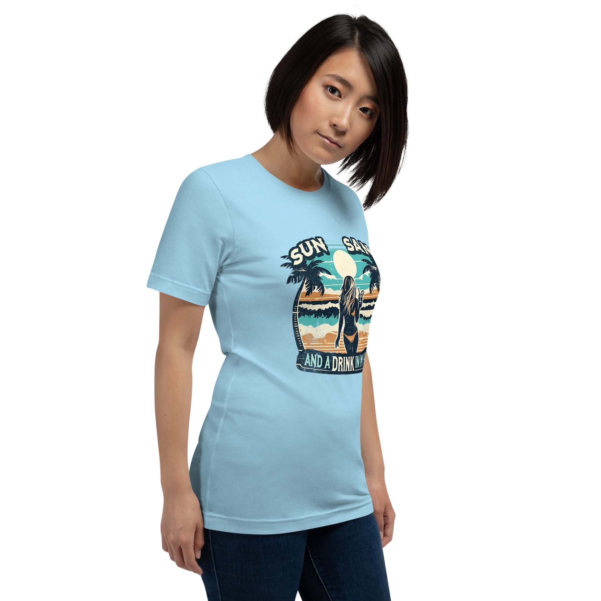 Woman with cocktail on beach on 'Sun, Sand, and a Drink in My Hand' tee, showcasing ocean and sun background