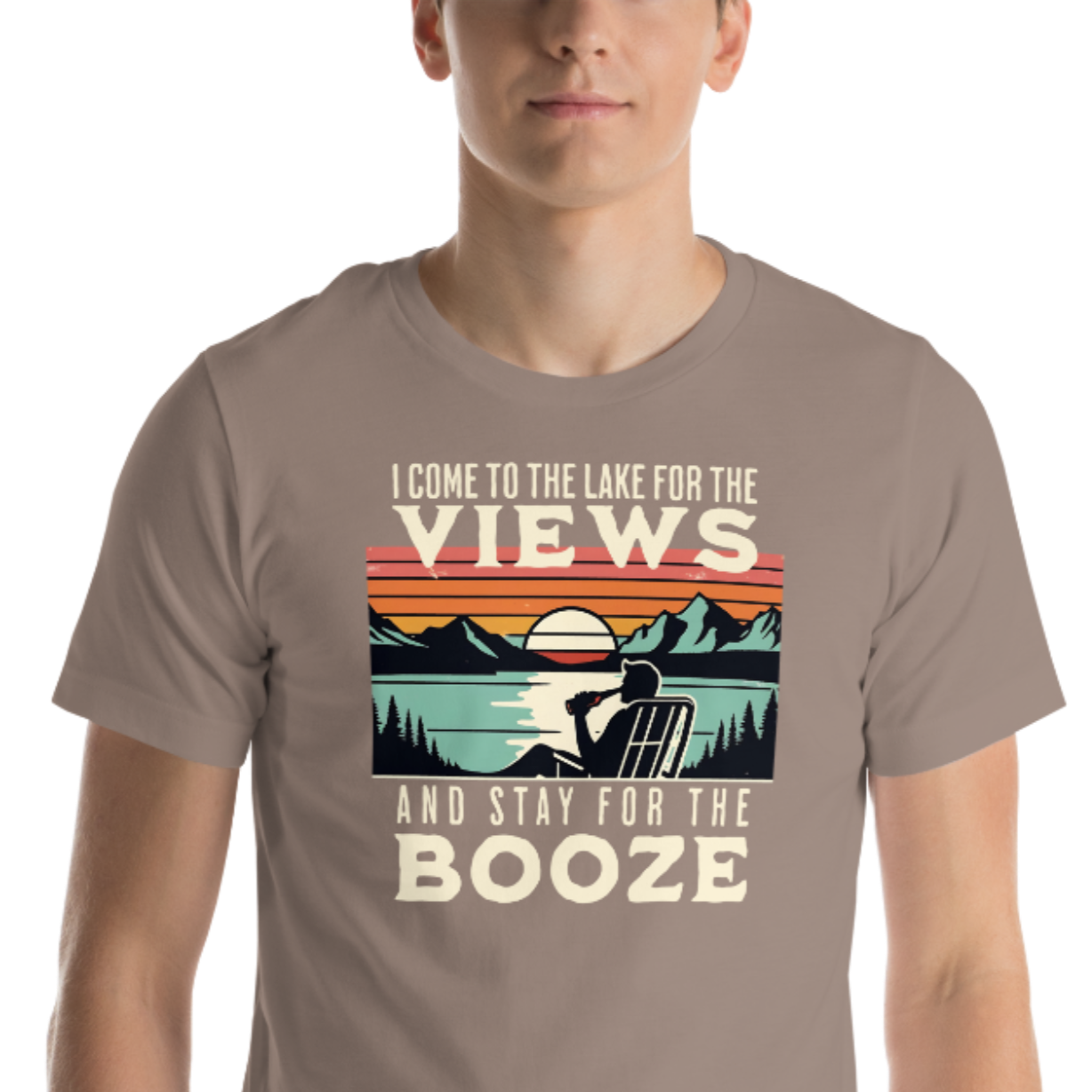 Tee showing "I Come to the Lake for the Views and Stay for the Booze," with a man in a beach chair, lake, and retro sunset.