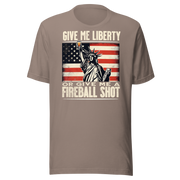 T-shirt with 'Give Me Liberty or Give Me a Fireball Shot' text, Statue of Liberty holding a shot glass, and distressed American flag background.