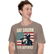 T-shirt with Day Drunk for America text, silhouette of a man drinking a bottle of beer, and distressed American flag background. Perfect for 4th of July.